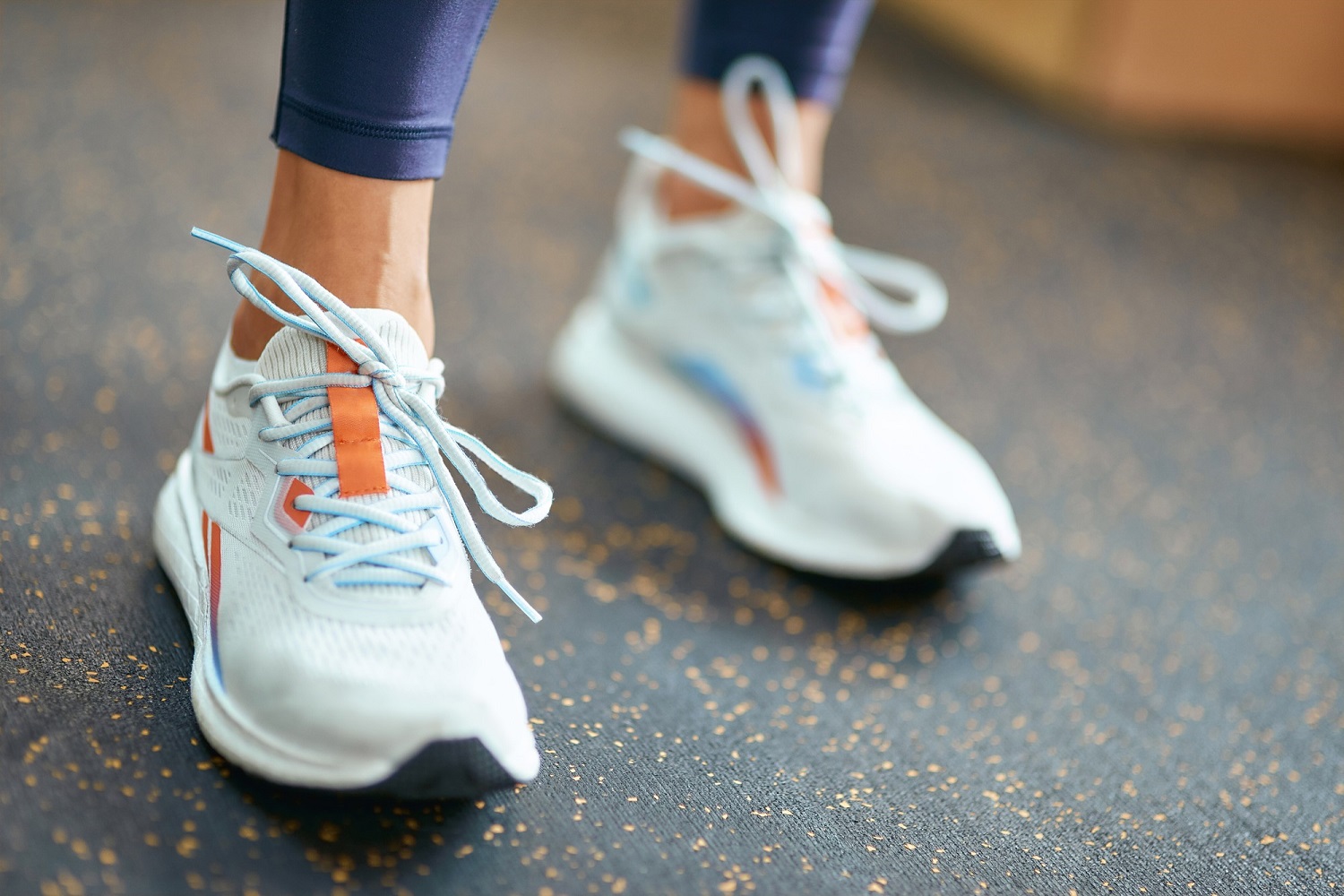 cropped-shot-female-wearing-sport-shoes-sneakers-standing-gym-workout-training-healthy-active-lifestyle-concept_386167-2979